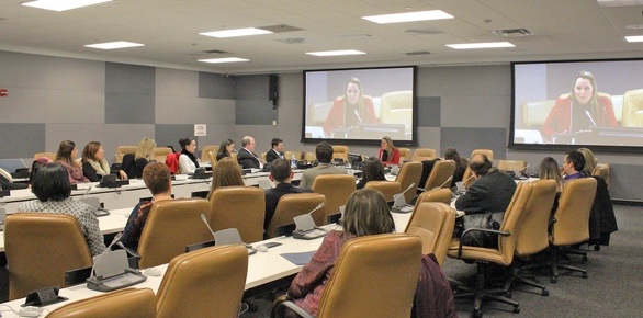 Cristiane Barreto speaking in a conference room at the United Nations Headquarters, New York